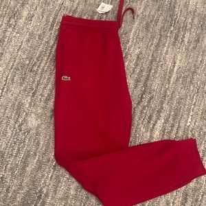 Men Lacoste jogger Pants size 6/xl brand new with tag.. burgundy